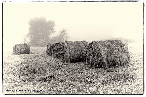4th Place B&W Print By Doug Conrad "Foggy Bales"